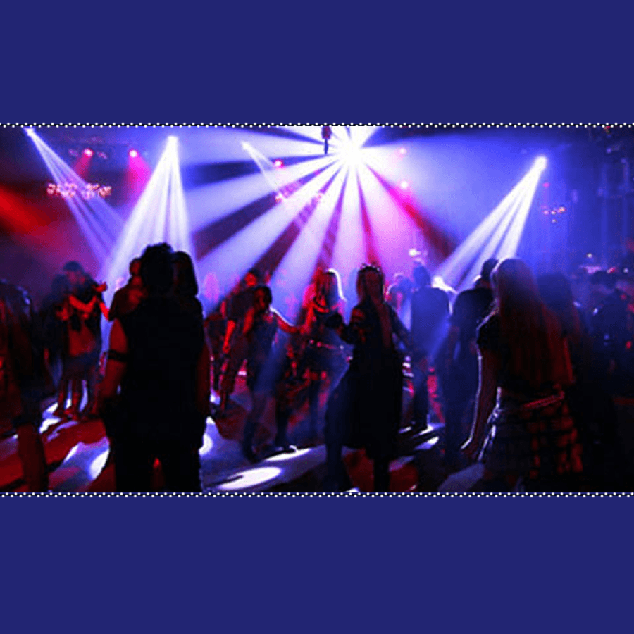 Dark blue and purple disco stage with dancers and strobing lights